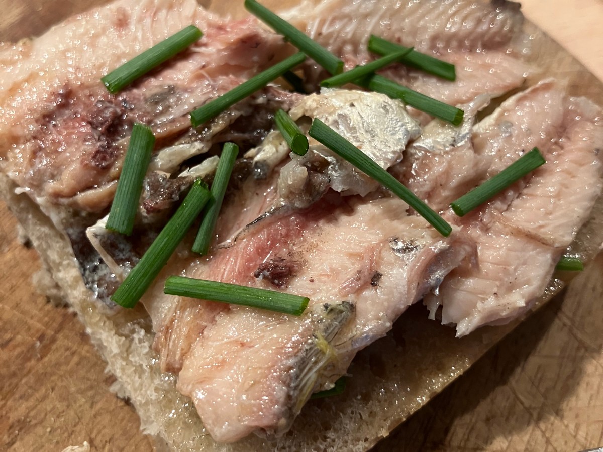 sardines with butter and chives on sourdough bread